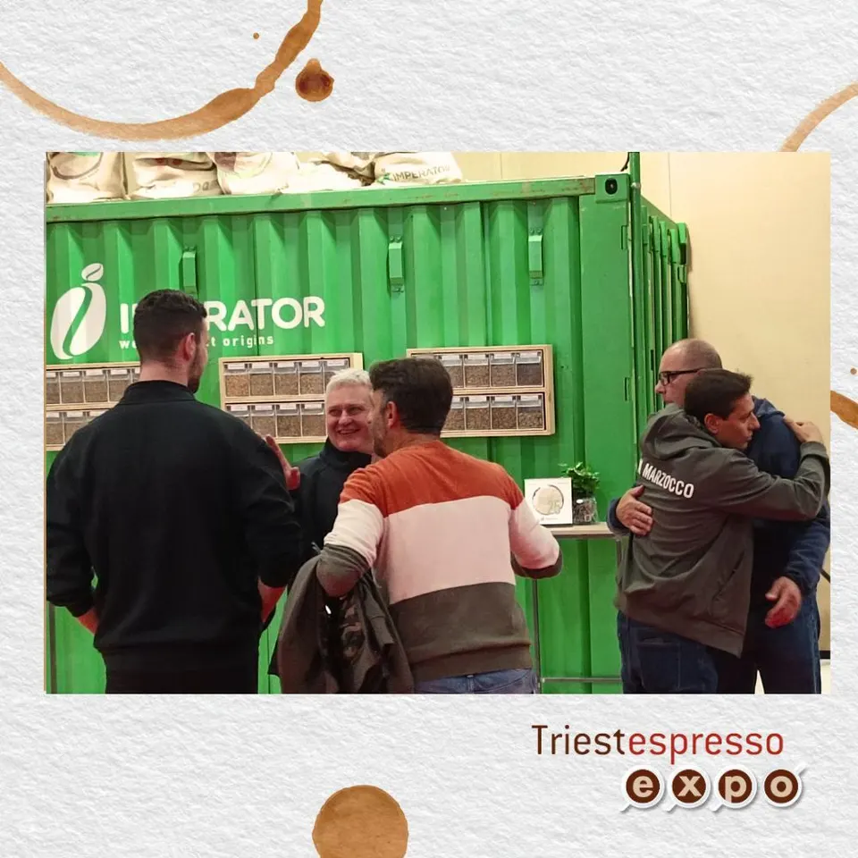 Exhibitors and visitors greeting each other