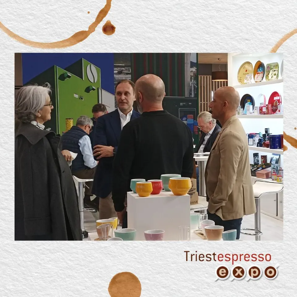 Visitors at a stand with colourful cups